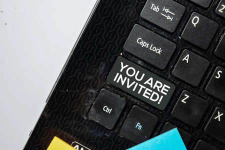 You Are Invited isolated on laptop keyboard backgroundの写真素材