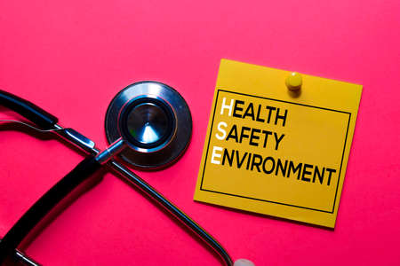 HSE. Health Safety Environment acronym on sticky notes. Office desk backgroundの写真素材