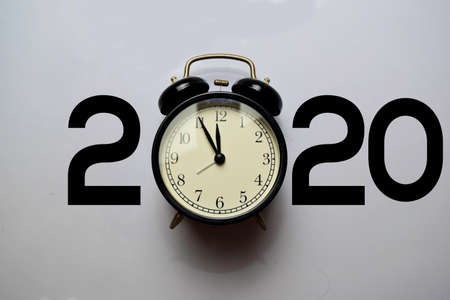 Happy New Year 2020 with Alarm Clock isolated on White backgroundの写真素材