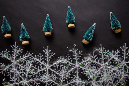 Decorative Christmas tree isolated on black backgroundの写真素材