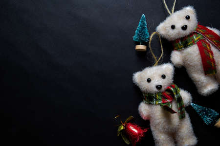 Decorative Christmas and snowman isolated on black backgroundの写真素材