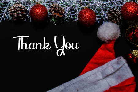 Thanks You text isolated on black backgroud. Frame of Christmas Decoration.