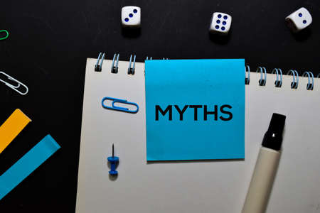 MYTHS text on sticky notes isolated on office deskの写真素材
