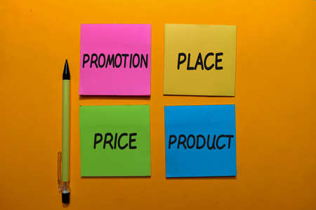 Promotion, Place, Price, Product write on sticky notes isolated on Office Desk