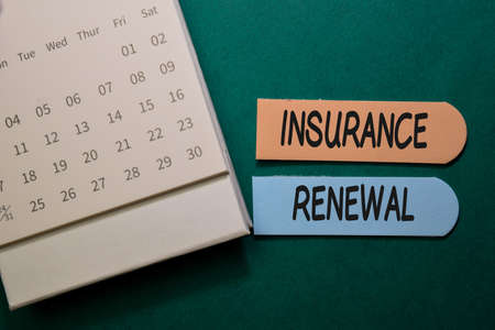 Insurance Renewal write on stick note isolated on Office Desk