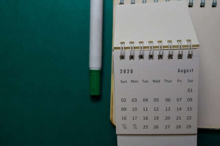 White Calendar August 2020 on office desk backgroundの写真素材