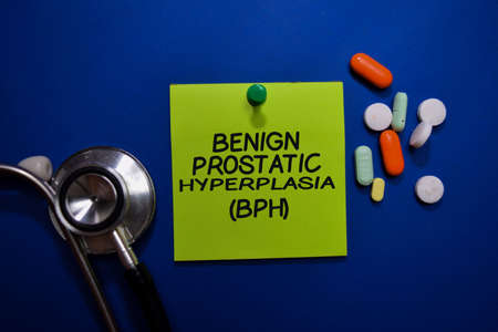 Benign Prostatic Hyperplasia (BPH) write on sticky note isolated on Office Desk. Healthcare or Medical Conceptの写真素材