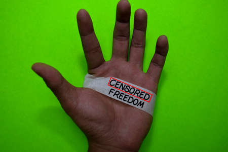 Censored Freedom write on Tape in man handの写真素材