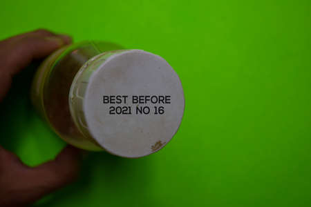 Close up text Best Before Date on Bottle Cap Foodの写真素材