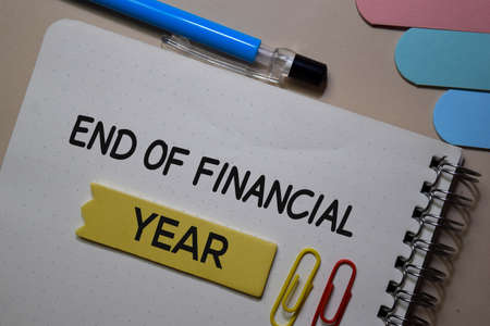 End of Financial write on a book isolated on Office Desk