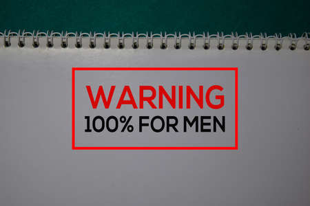 Warning 100% For Men write on a book isolated on green background.の写真素材