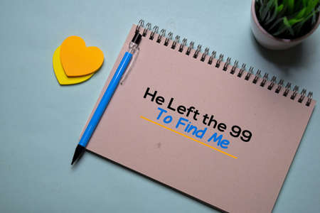 He Left the 99 - To Find Me write on a book isolated on office desk. Christian faith conceptの写真素材