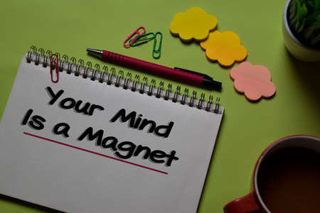 Your Mind Is a Magnet write on a book isolated on office desk.