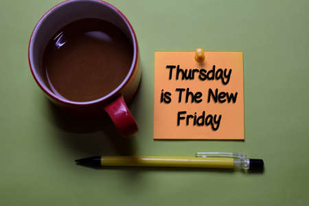 Thursday is the New Friday write on a sticky note isolated on office desk.