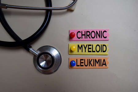 Chronic Myeloid Leukemia text on Sticky Notes. Top view isolated on office desk. Healthcare/Medical...