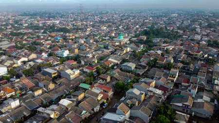 Aerial POV view Depiction of flooding. devastation wrought after massive natural disasters at Bekasi - Indonesiaの写真素材