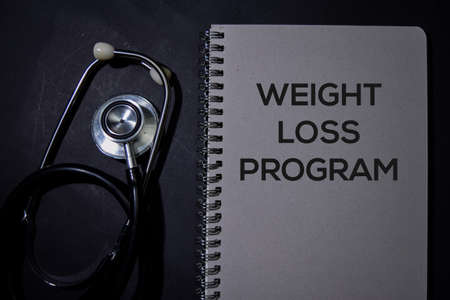 Weight Loss Program write on a book isolated on Office Desk. Healthcare or Medical Conceptの写真素材
