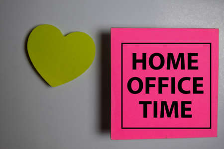Home Office Time write on a book isolated on Office Desk.の写真素材