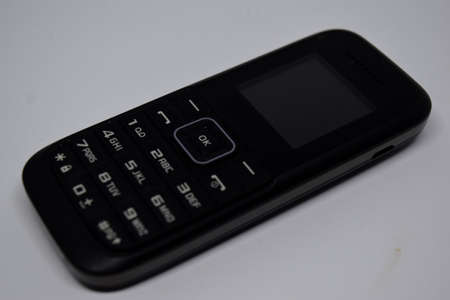 Close up old handphone isolated on White Background.