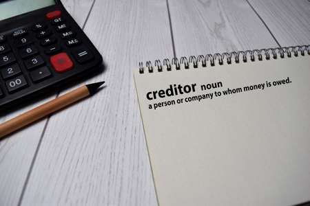 Definition of Creditor word with a meaning on a book. dictionary conceptの写真素材