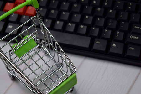 Mini shopping cart and Keyboard Computer. Online Shopping concept