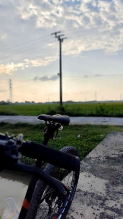 Mountain Bike on the edge of rice fields. Bekasi, Indonesia June 30 2020
