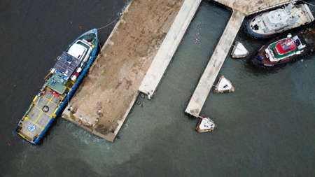 Aerial view over the marunda harbor, downtown Jakarta, Indonesia with development buildings, transportation. Jakarta, Indonesia July 3 2020のeditorial素材