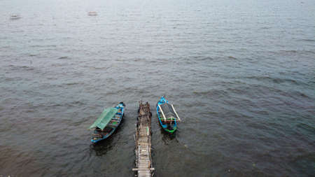 Aerial view over the marunda harbor, downtown Jakarta, Indonesia with development buildings, transportation. Jakarta, Indonesia July 3 2020のeditorial素材