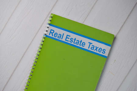 Book about FSBO Noticed isolated on wooden table.の写真素材