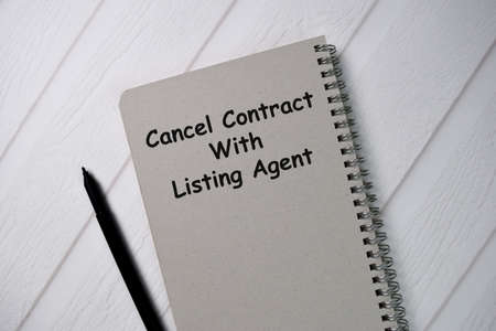 Roof Repair text write on a book isolated wooden table.の写真素材