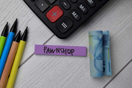 Bidding War and House For Sale write on sticky notes isolated on Office Desk