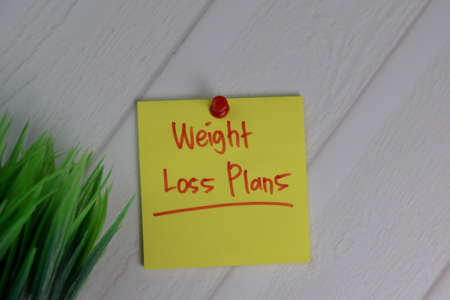 Promotion Ideas write on sticky notes isolated on office desk.