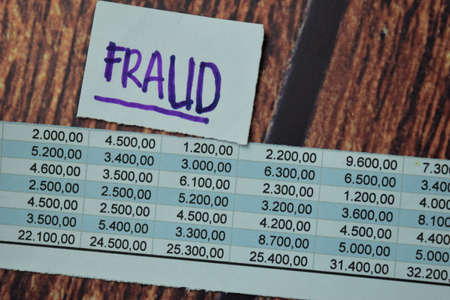 Cyber Threats write on a book with keywords isolated on office desk.の写真素材