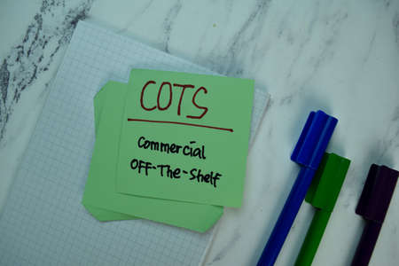 Inspection write on sticky note isolated on Wooden Table. Supported by additional service. Business...