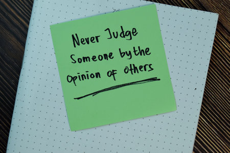 Do everything with a good heart & Expect nothing in return write on sticky notes isolated on Wooden Table. Motivation conceptの写真素材