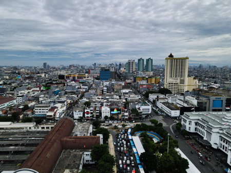 Aerial View. Fatahilah museum at Old City at Jakarta, Indonesia. With with Jakarta cityscape and noise cloud when sunset. JAKARTA, INDONESIA - DECEMBER, 30, 2020のeditorial素材