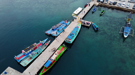Pier with at Lampung Sea Pahawang Beach, located near the Sumatera city aerial drone. Resort...