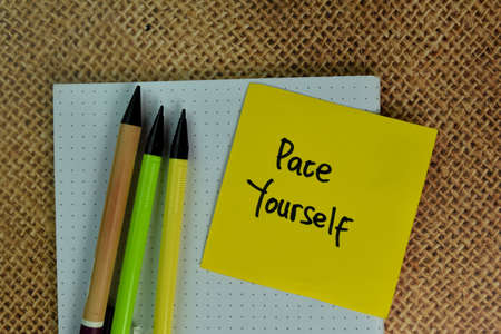 Moratorium Plan write on sticky notes isolated on Wooden Table.
