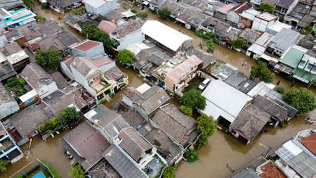 Aerial POV view Depiction of flooding. devastation wrought after massive natural disasters. BEKASI, WEST JAVA, INDONESIA. FEBRUARY 19, 2021のeditorial素材