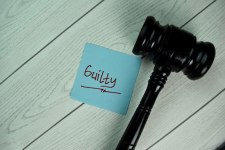 Where to Invest? write on sticky notes isolated on Wooden Table.