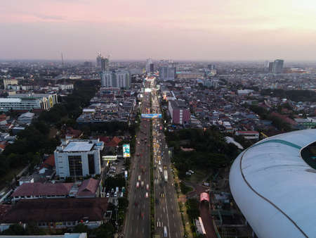 Aerial View of The largest stadium of Bekasi from drone when sunset and noise cloud. Bekasi, Indonesia, March 21, 2021のeditorial素材