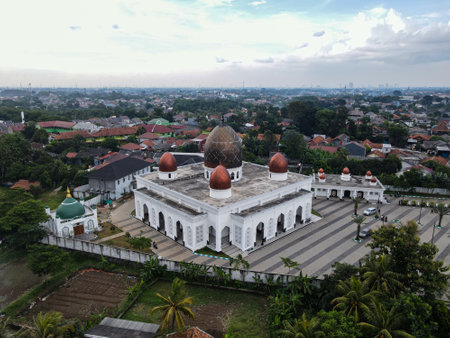 Nurul Mustofa Center Mosque panorama view Largest Mosque in Depok. Ramadan and Eid Concept and noise cloud when sunset or sunrise view. Depok, Indonesia. March, 25, 2021のeditorial素材