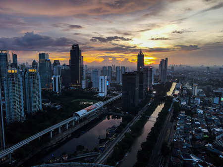 aerial view of Sunset in the skyscrapers of Jakarta. Jakarta, Indonesia, April 4, 2021のeditorial素材