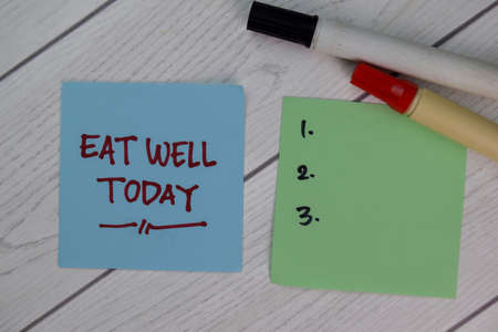 Setup Set Today write on a paperwork and supported by additional services isolated on Wooden Table.