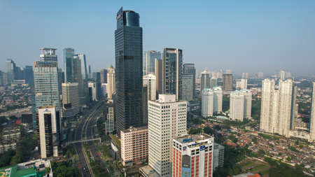 Aerial view of Architecture details Modern Building Glass facade Business background. JAKARTA -...