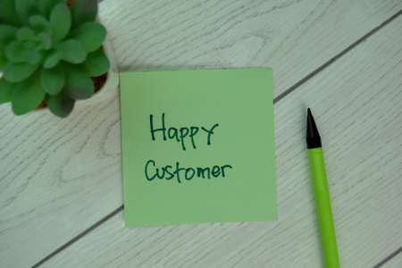 Accelerating Growth write on sticky notes isolated on Wooden Table.の写真素材