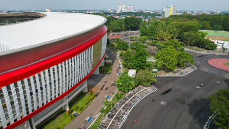Aerial top down view of the Beautiful scenery of Manahan Solo Stadium. with cityscape background. Solo, Indonesia, July 1, 2021のeditorial素材