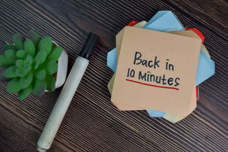 Syndrome write on sticky notes isolated on Wooden Table.の写真素材