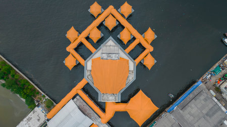 Aerial drone view of wooden boats leaning beside the pier. With noise cloud. Jakarta, Indonesia, August 3, 2021のeditorial素材