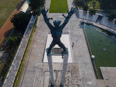 Aerial view of West Irian Liberation monument in downtown Jakarta with Jakarta cityscape. Jakarta, Indonesia, September 5, 2021のeditorial素材